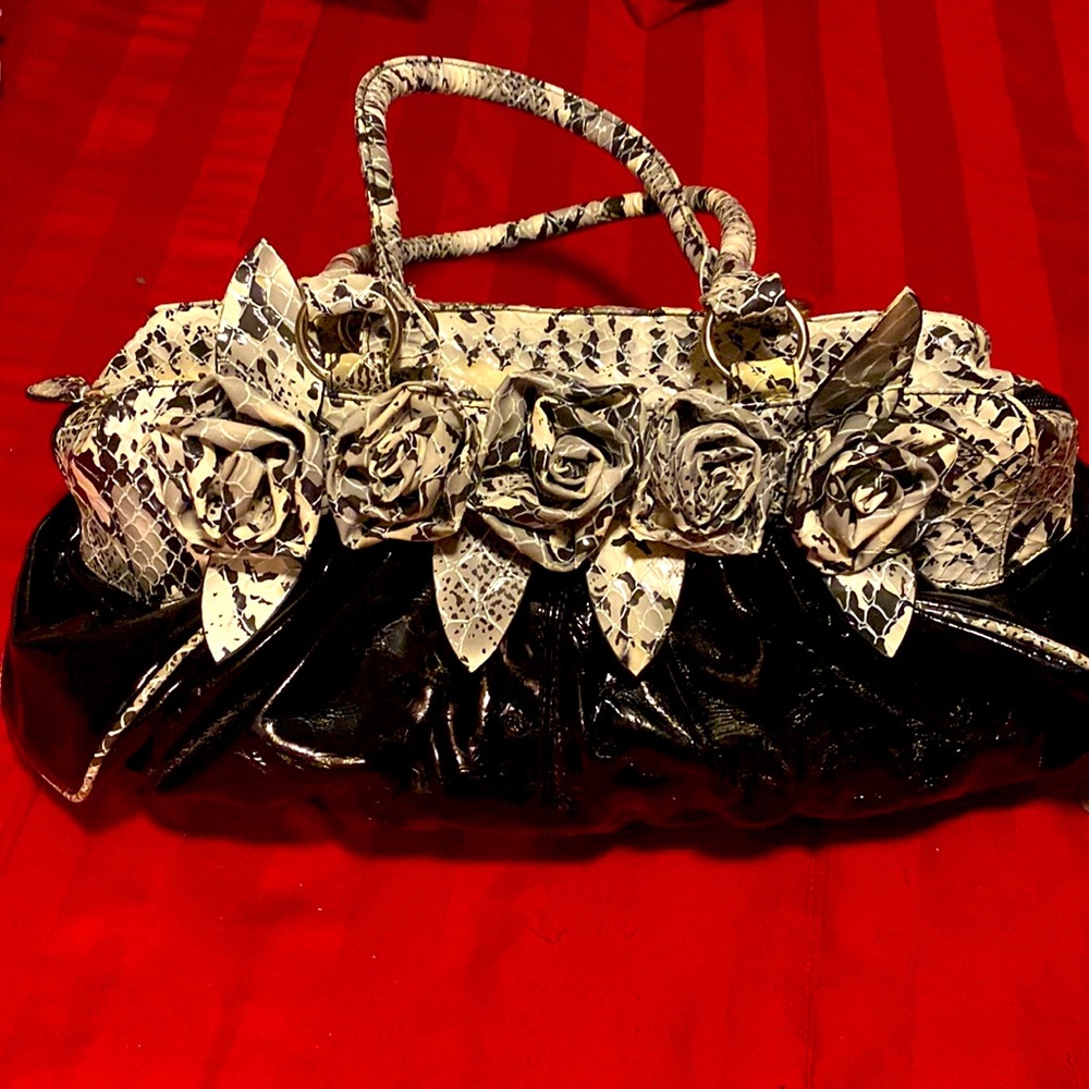Large faux patent leather/snakeskin satchel bag. No brand. Good condition.